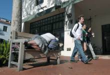 Business Owners Buy Tickets for 15 Homeless People