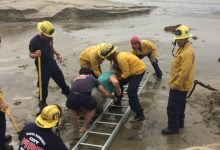 Firefighters Rescue Woman Trapped in Quicksand at East Beach