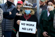 Protesters Rally at Tre Lune Restaurant Against Business Closures