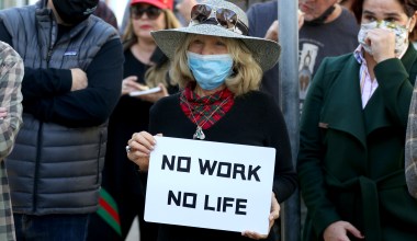 Protesters Rally at Tre Lune Restaurant Against Business Closures