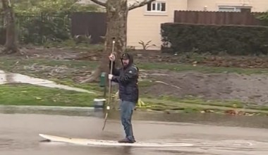 Cars and Kayaks Awash During Flood in Santa Barbara